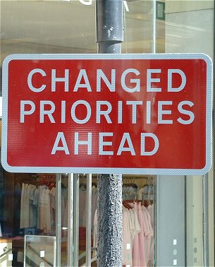 It says, Changed Priorities Ahead