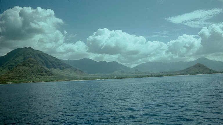 Mountains shrouded in clouds, seen from Kaneohe Bay