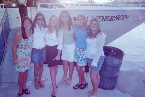 SACS girls; you can just barely glimpse the boat's name behind them.